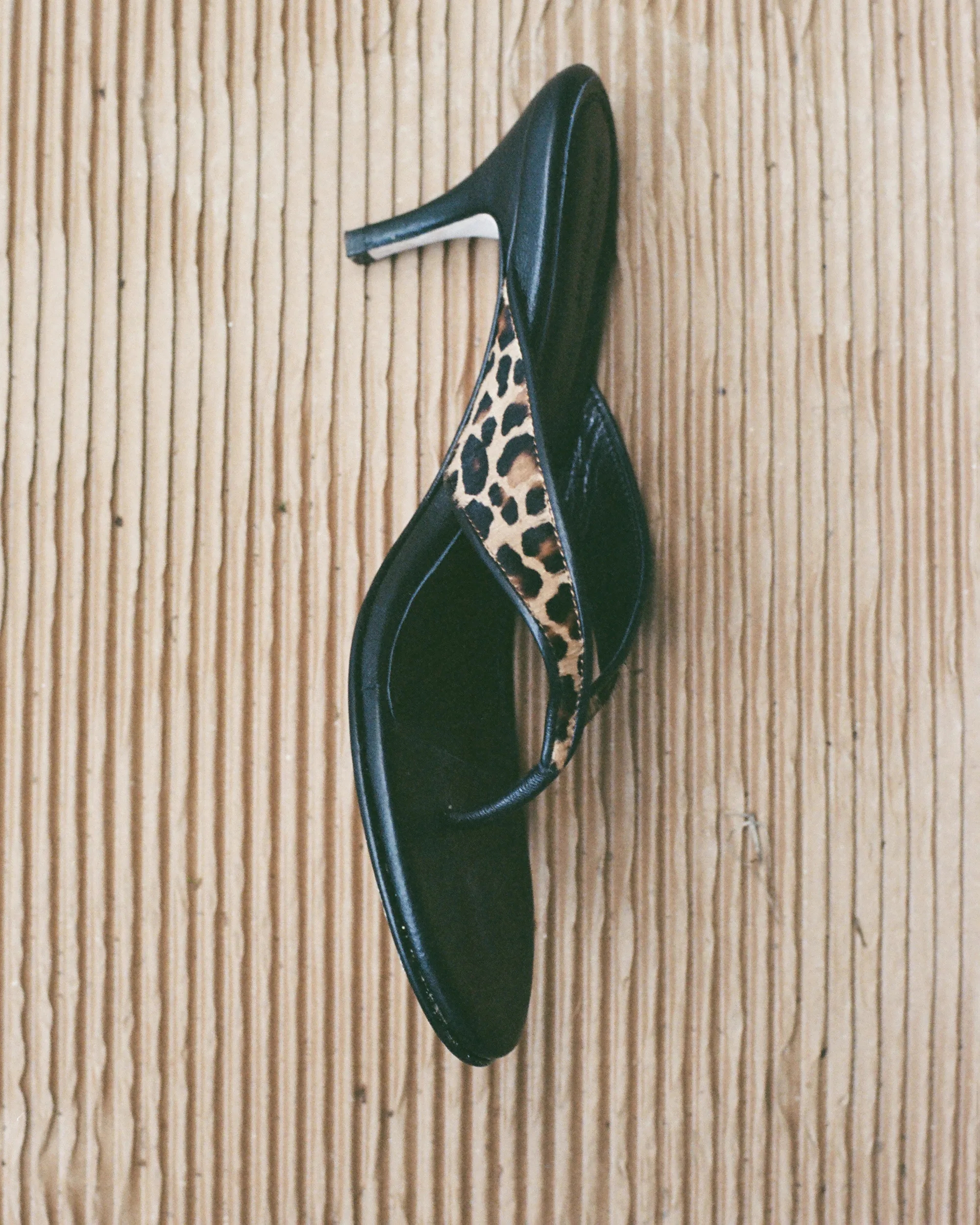 Slip-on thong-style sandals in leather
